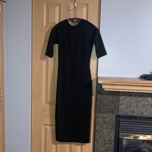 Low back line black dress. Small